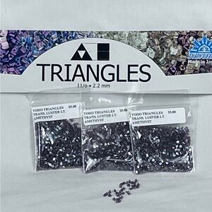 Toho Triangle Beads. Translucent  Luster, Light Amethyst. 3pk